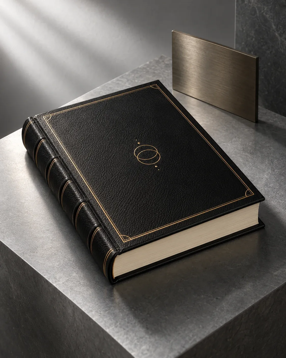 Concept: black leather book with gold foil detailing